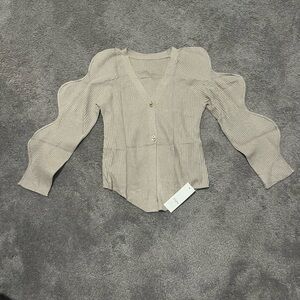 Beige Ribbed Cardigan with Wavy Sleeves